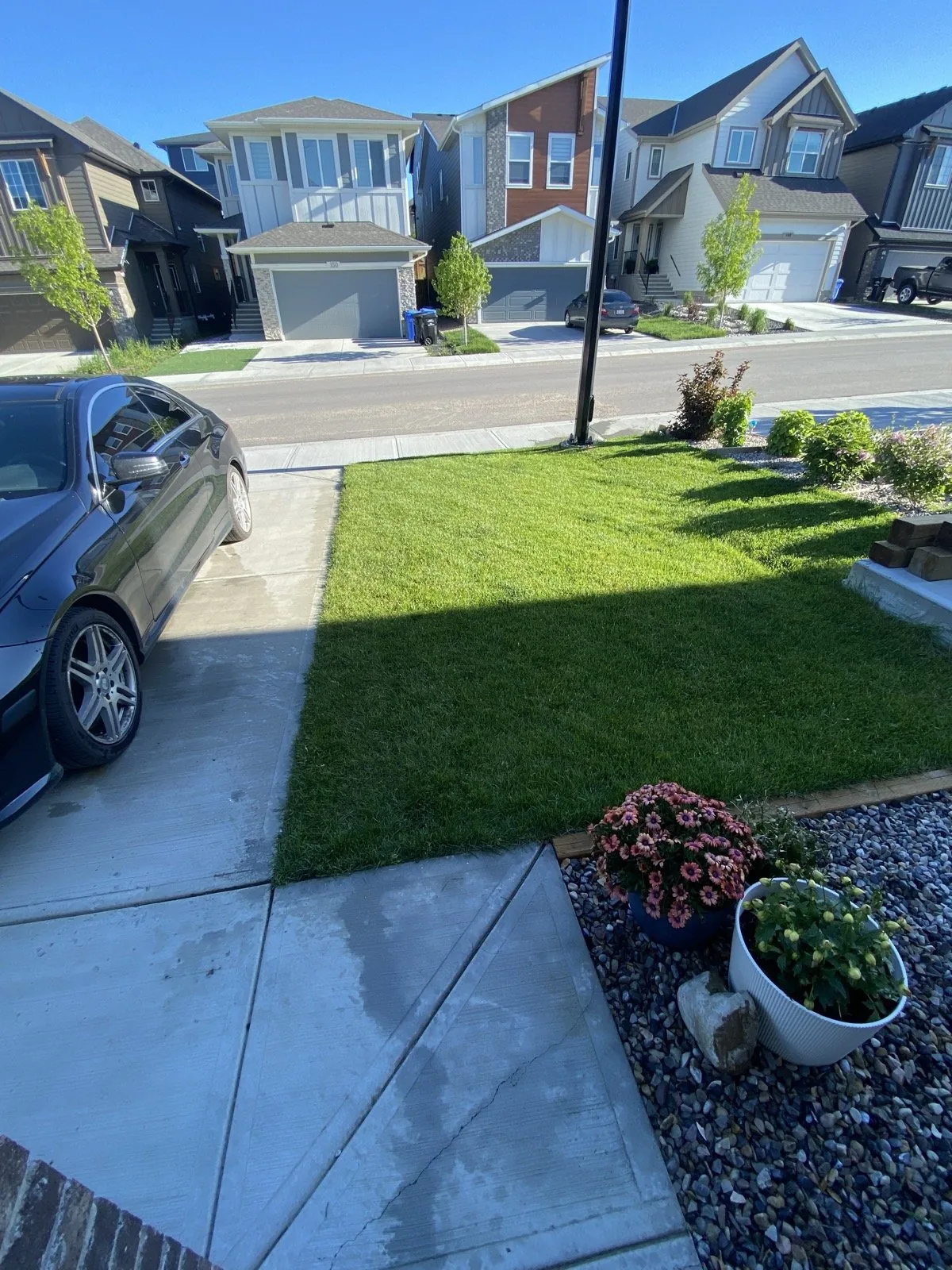 A healthy front lawn and clean walks on a service stop