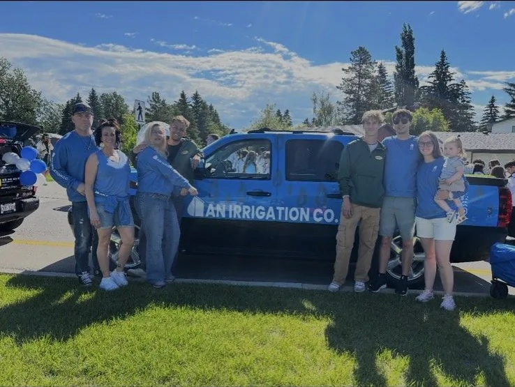 The AN Irrigation Co Sprinkler Systems crew in front of the company truck in Calgary